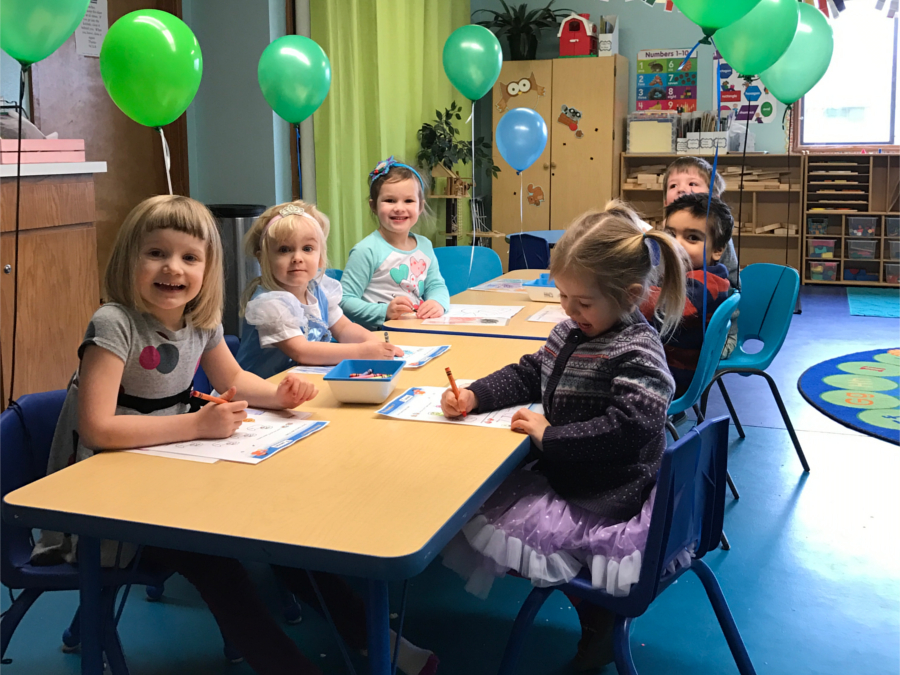 Pre-K student playing with classroom toys